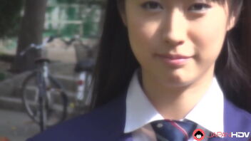 Tomomi Motozawa in school uniform gives blow job to a classmate