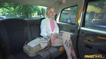 A blonde gets a tough and hard sex in a taxi cab.