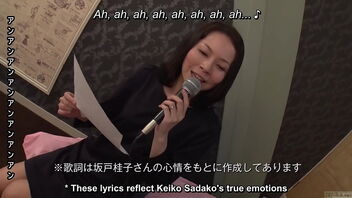 A mature Japanese woman sings tempting songs and has sex while using a karaoke machine.