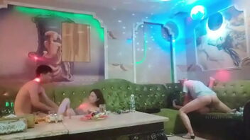 Group sex in a Chinese KTV bar with a kinky sitting woman