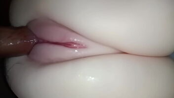 Close up of a sexy teen's vagina while having sex with her lover before bed