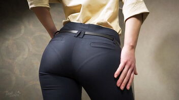 Japanese beauty in tight work clothes flaunts her panties and her great ass.