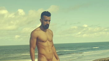 A skinny homo dude gets off on a nudist beach.