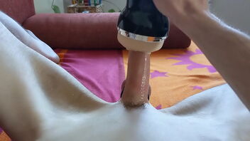 Skinny German stud tries out Fleshlight alone and even cums.